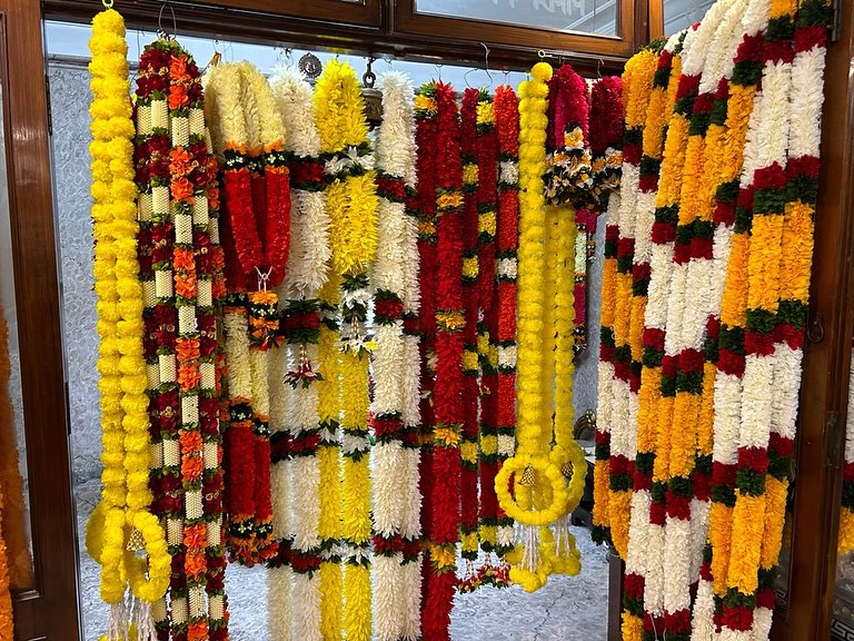 Festive Flower Garland and Bandanwar Collection, a festival décor piece, shown in a 8-image Instagram carousel. Image 8 of 8.