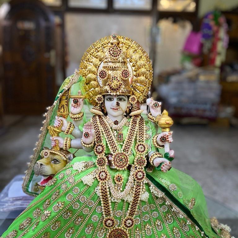 Green Deity Poshak and Shringar, a poshak & shringar piece.